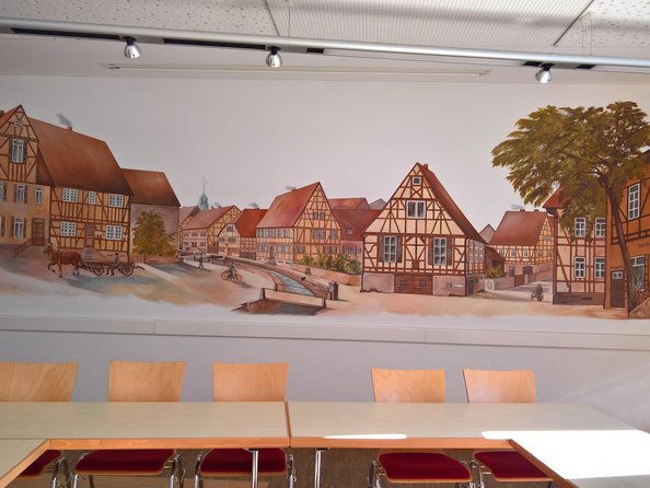 Wandgemälde im Adam-Schmitt-Saal (historische Ansicht der Dorfmitte)